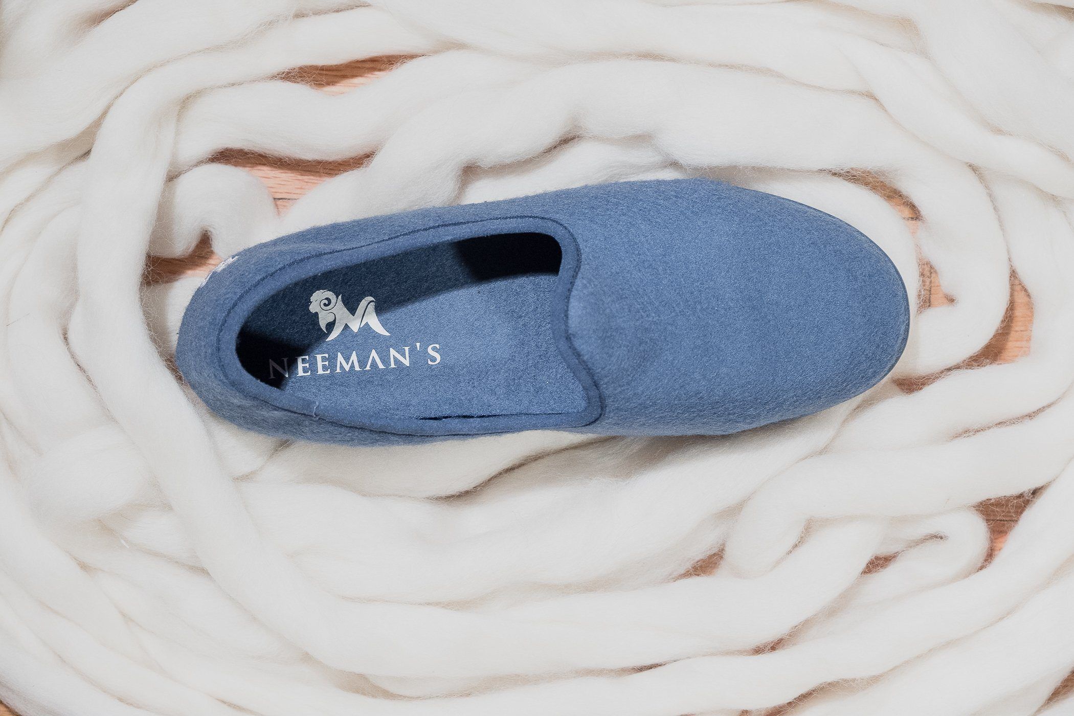 Why did Neeman’s choose Merino Wool to make shoes?