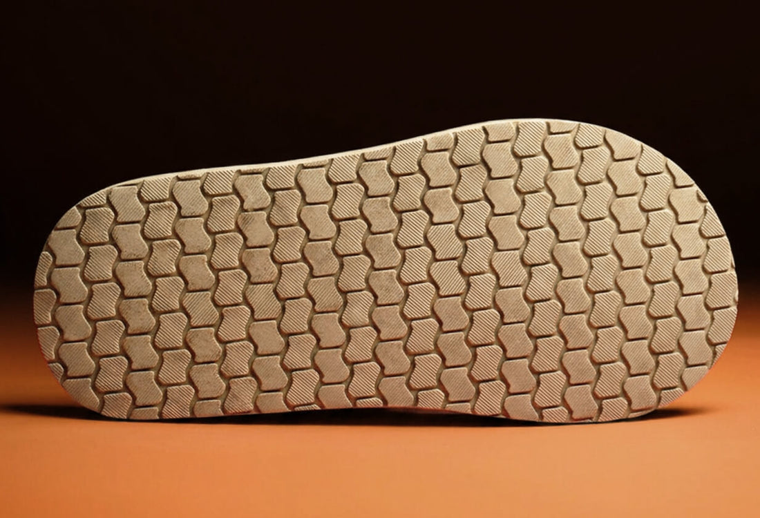 Textured slip-resistant rubber bottom sole