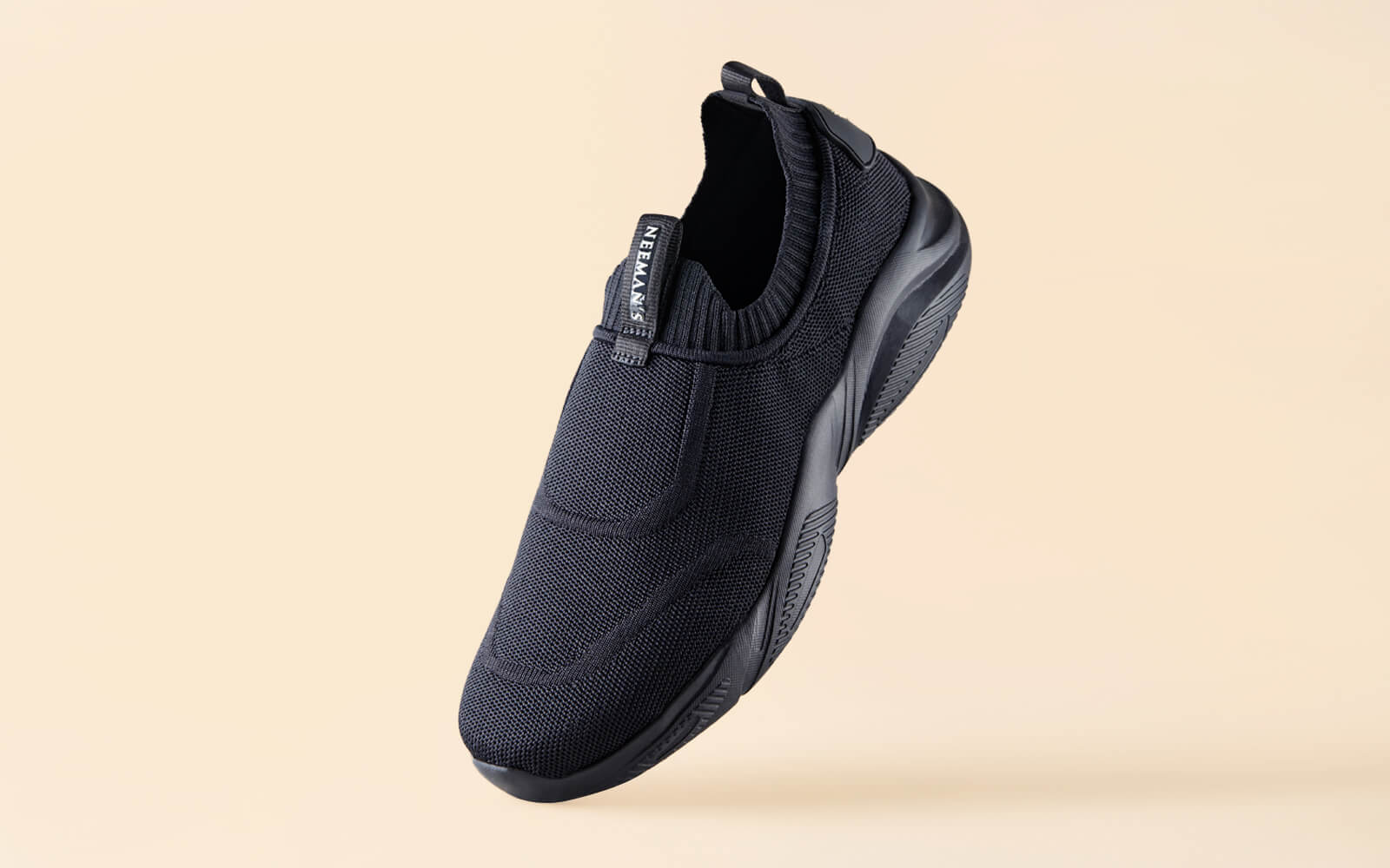 Nike black best sale slip on shoes